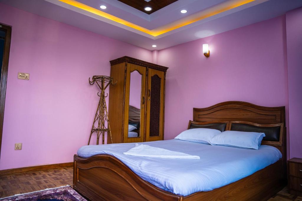 Postel nebo postele na pokoji v ubytování Homestay Book Now