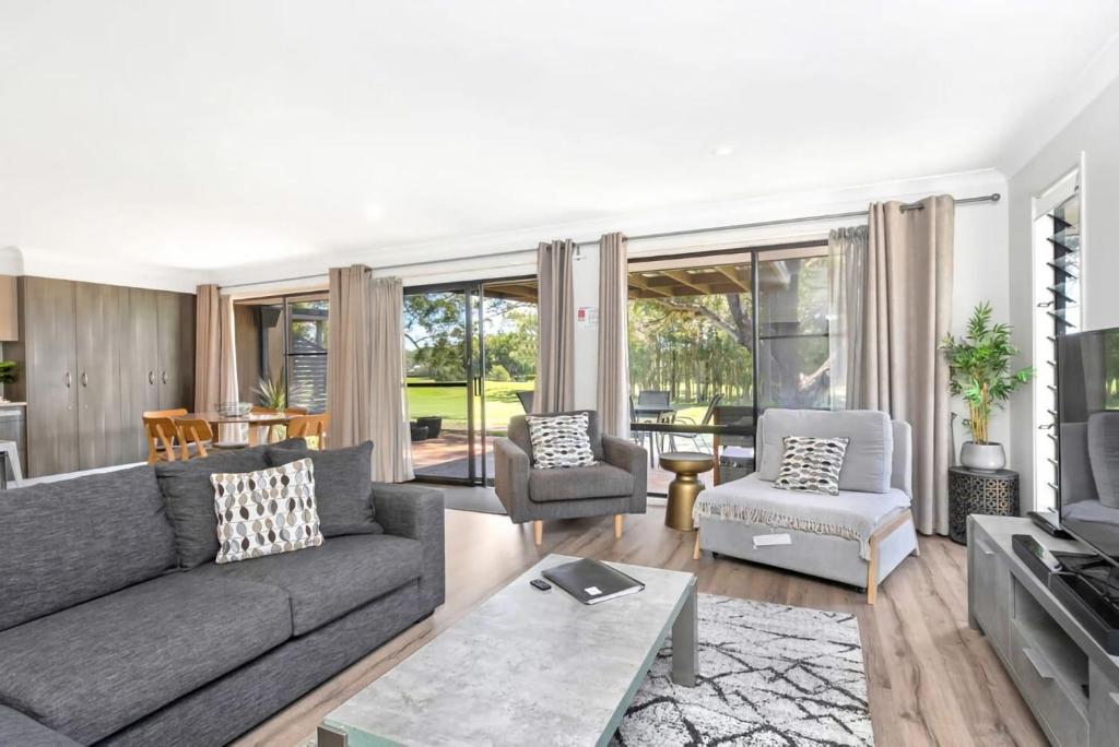 Χώρος καθιστικού στο Hitters Paradise Stay Play