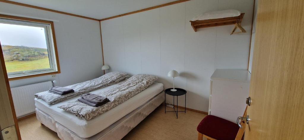 Postel nebo postele na pokoji v ubytování Skútustadir Guesthouse