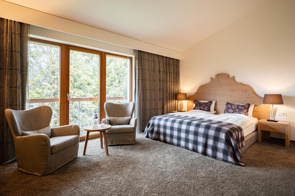 Postel nebo postele na pokoji v ubytování Hotel Exquisit