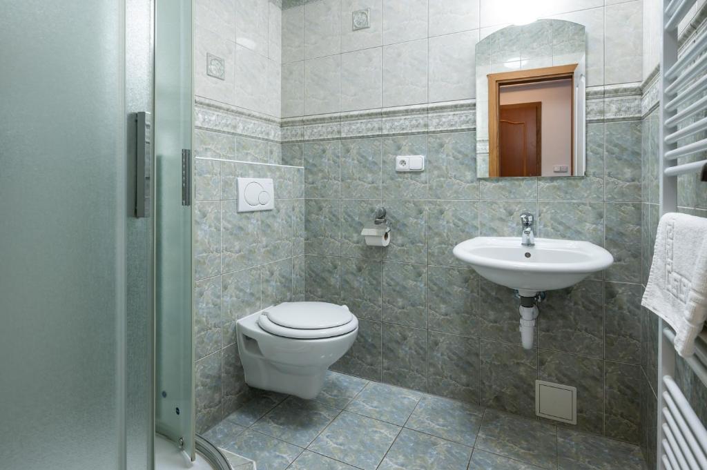 Koupelna v ubytování Valašský Hotel a Pivní lázně OGAR