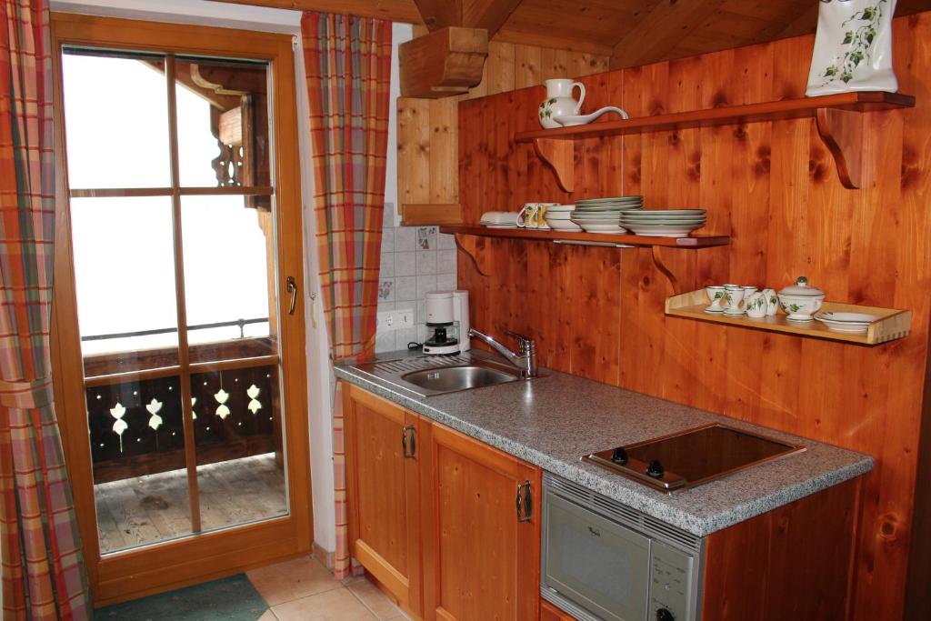 Een keuken of kitchenette bij Himmelbauer Apartments