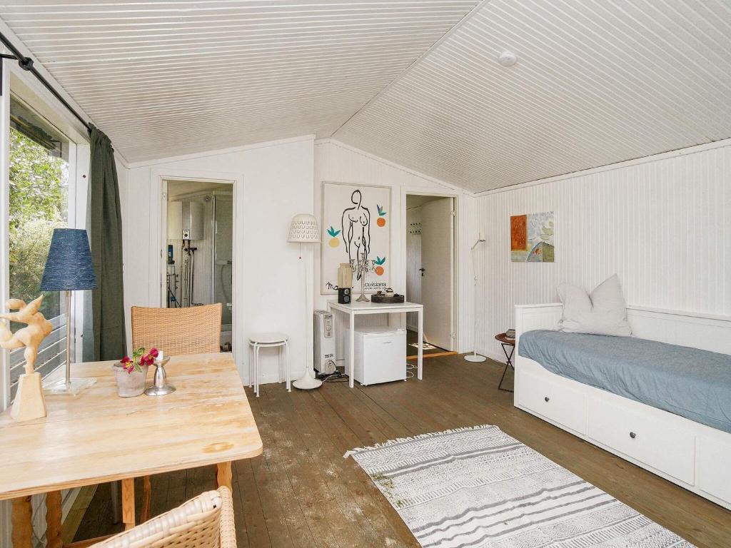 Postel nebo postele na pokoji v ubytování Holiday home Græsted IV