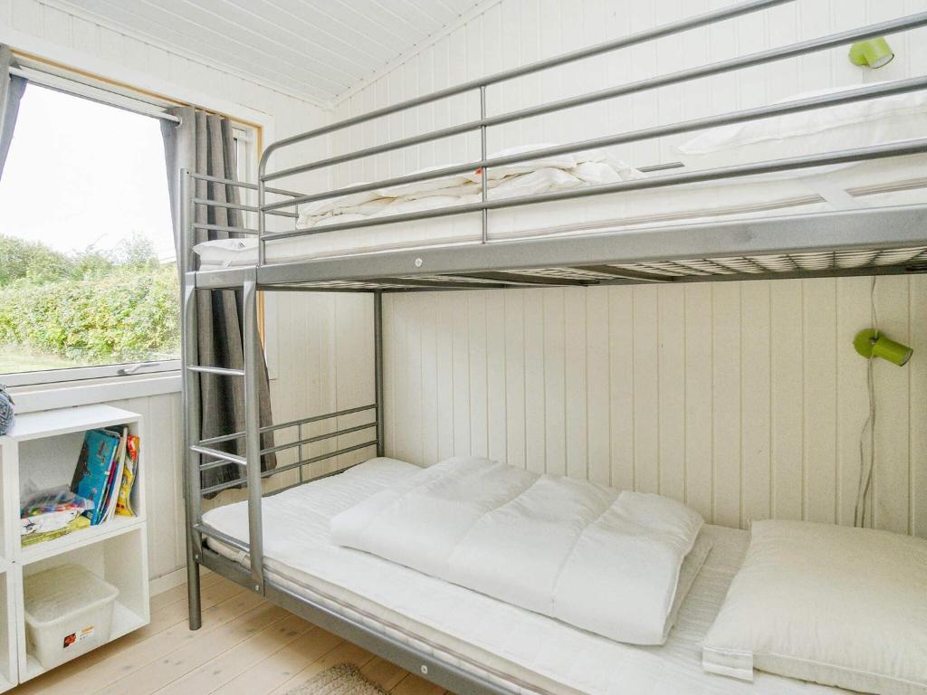 Postel nebo postele na pokoji v ubytování Holiday home Græsted IV