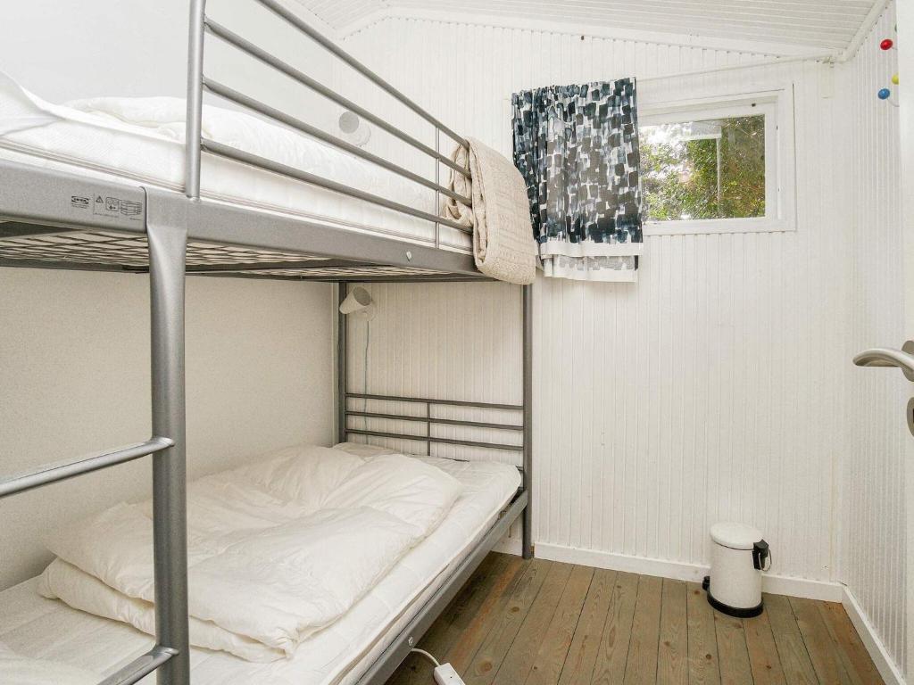 Postel nebo postele na pokoji v ubytování Holiday home Græsted IV