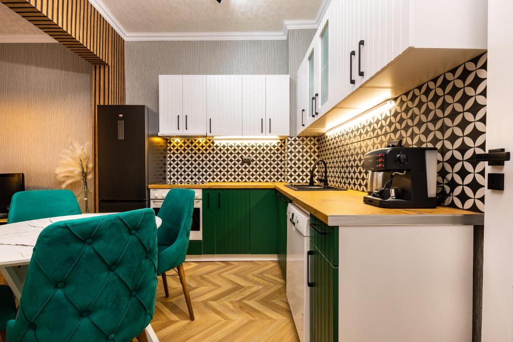 Kuchyň nebo kuchyňský kout v ubytování The Urban Nest-2BD Apartment with a Terrace by Flat Mаnager
