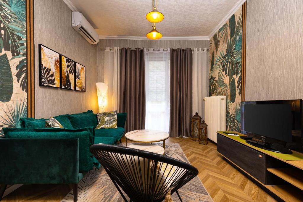 TV a/nebo společenská místnost v ubytování The Urban Nest-2BD Apartment with a Terrace by Flat Mаnager