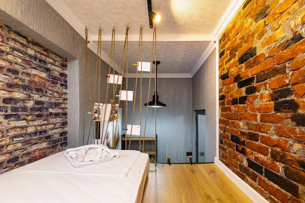 Postel nebo postele na pokoji v ubytování The Urban Nest-2BD Apartment with a Terrace by Flat Mаnager