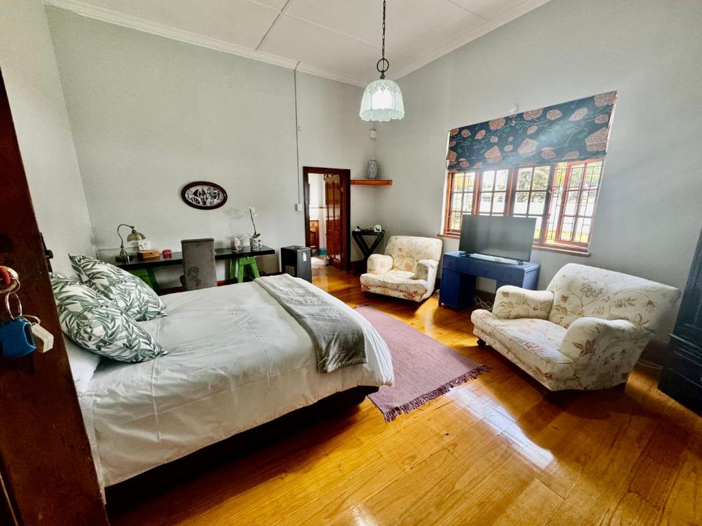 Postel nebo postele na pokoji v ubytování Whistlewood Guesthouse Walmer, Port Eizabeth