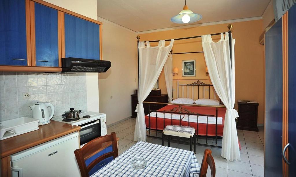 Kuchyň nebo kuchyňský kout v ubytování Pergola Hotel