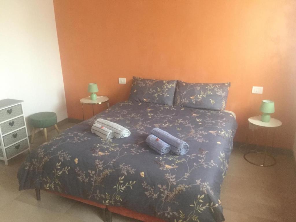 Łóżko lub łóżka w pokoju w obiekcie Le Colombe
