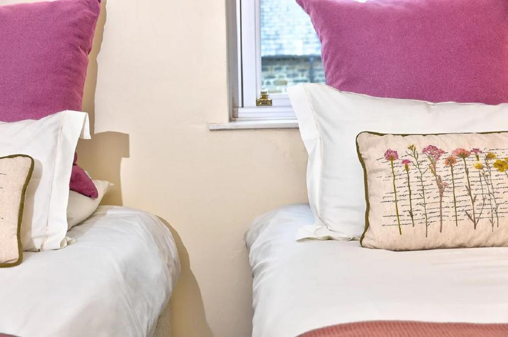 Postel nebo postele na pokoji v ubytování Apartment 11