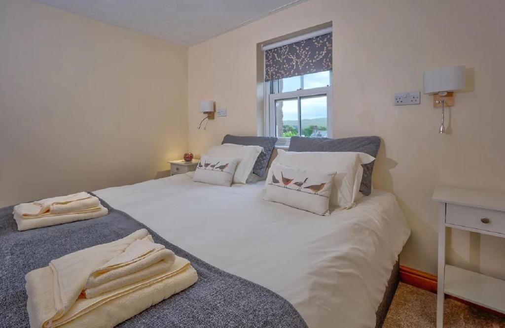 Postel nebo postele na pokoji v ubytování Apartment 11