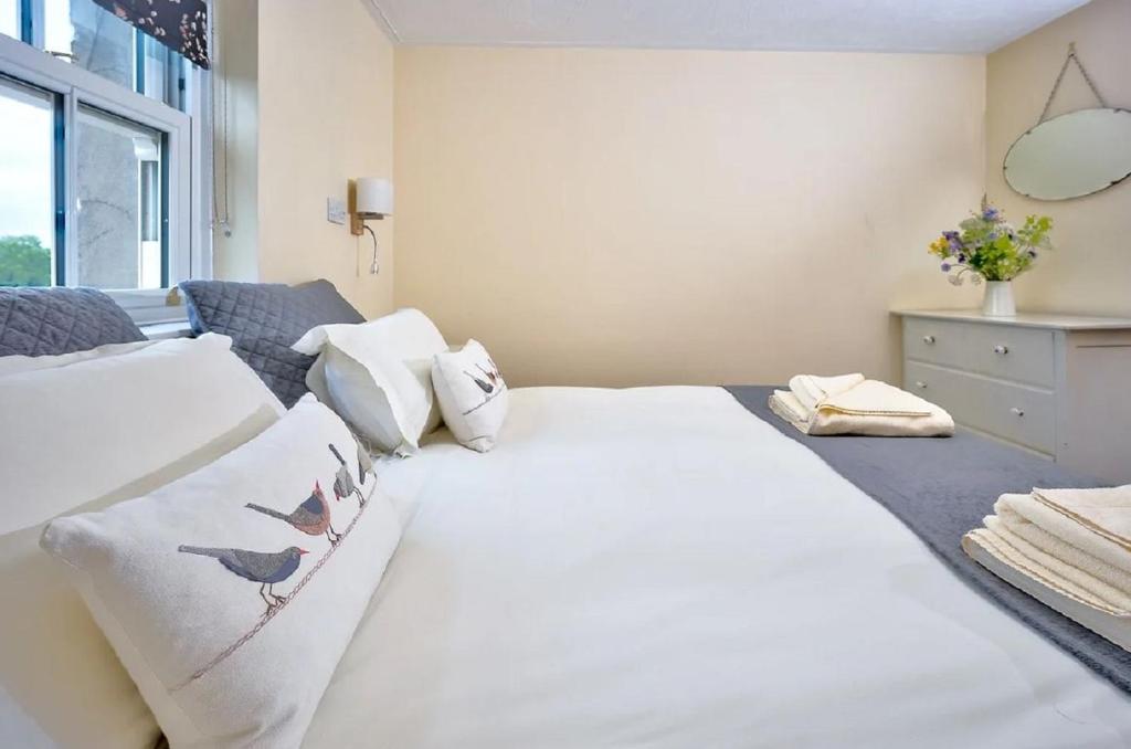 Postel nebo postele na pokoji v ubytování Apartment 11