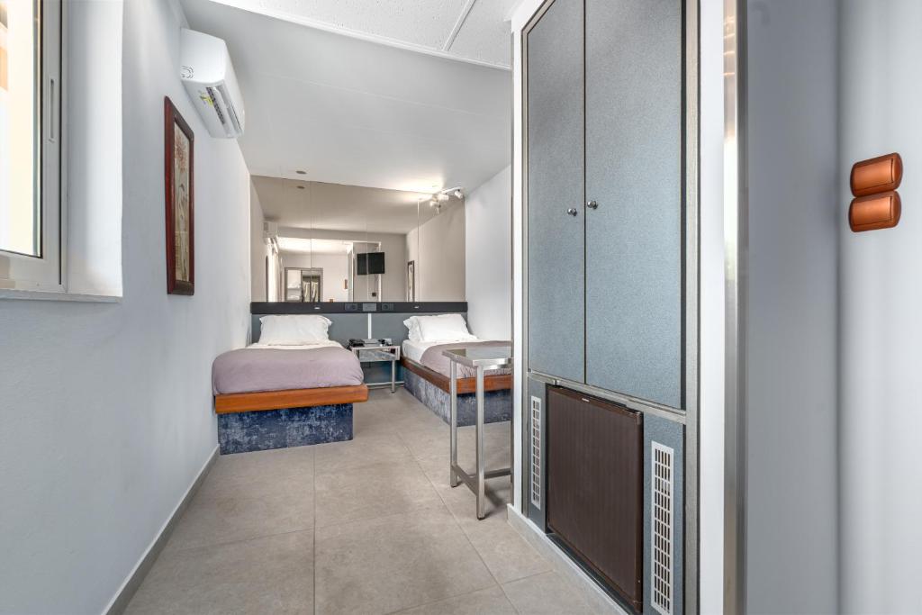 Kuchyň nebo kuchyňský kout v ubytování ALFA HOTEL