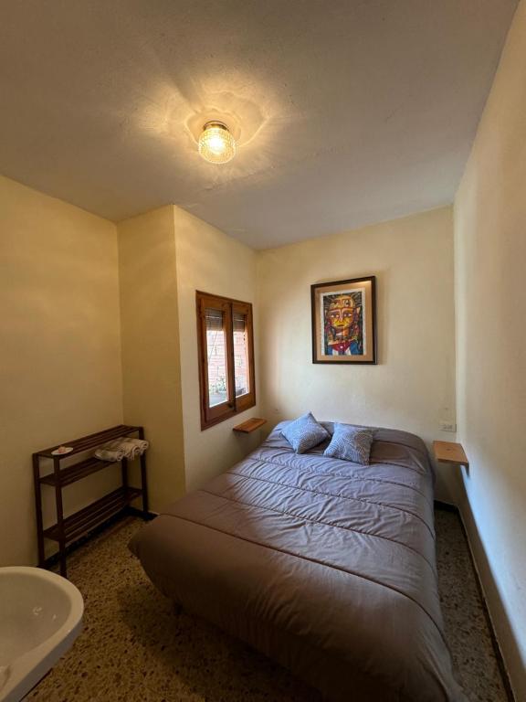 Postel nebo postele na pokoji v ubytování L Esquella Restaurante hostal
