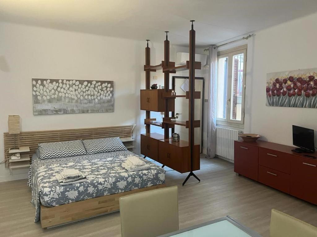 En eller flere senge i et værelse på Casa Vacanze Il Canale