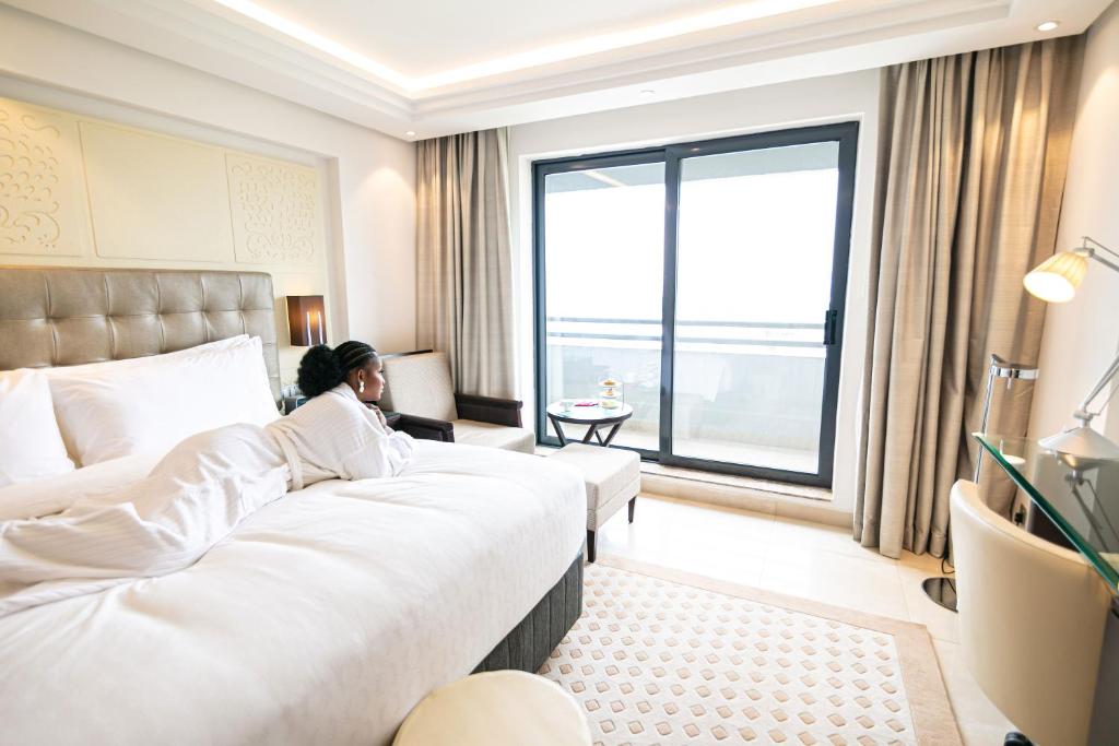 Postel nebo postele na pokoji v ubytování Abuja Continental Hotel
