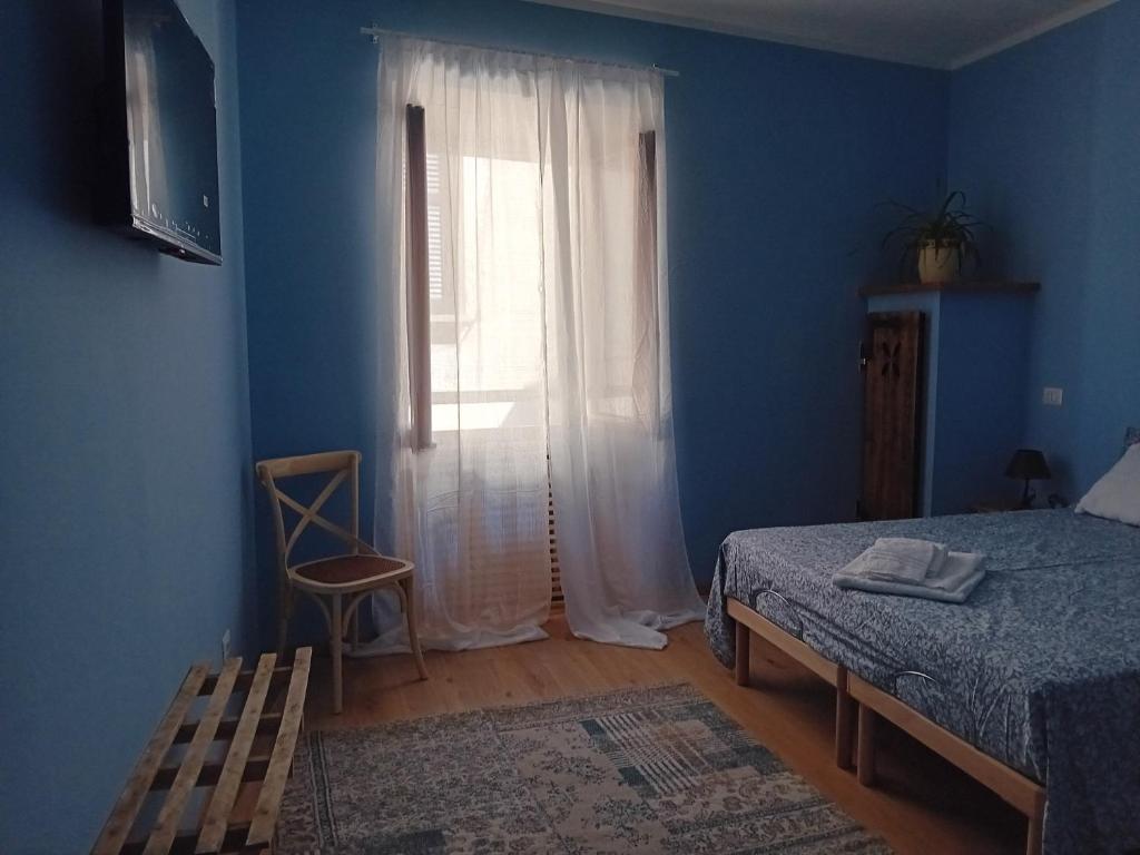 Postel nebo postele na pokoji v ubytování B&b la lanterna