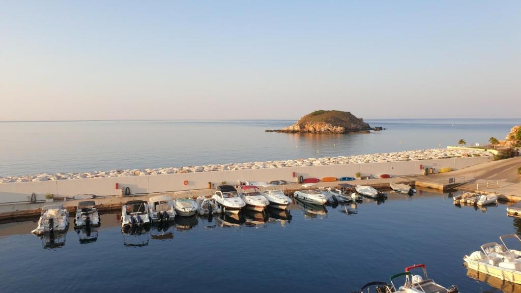 an aerial view of a marina with boats in the water at Appart vue d'exception sur la mer in Bandol