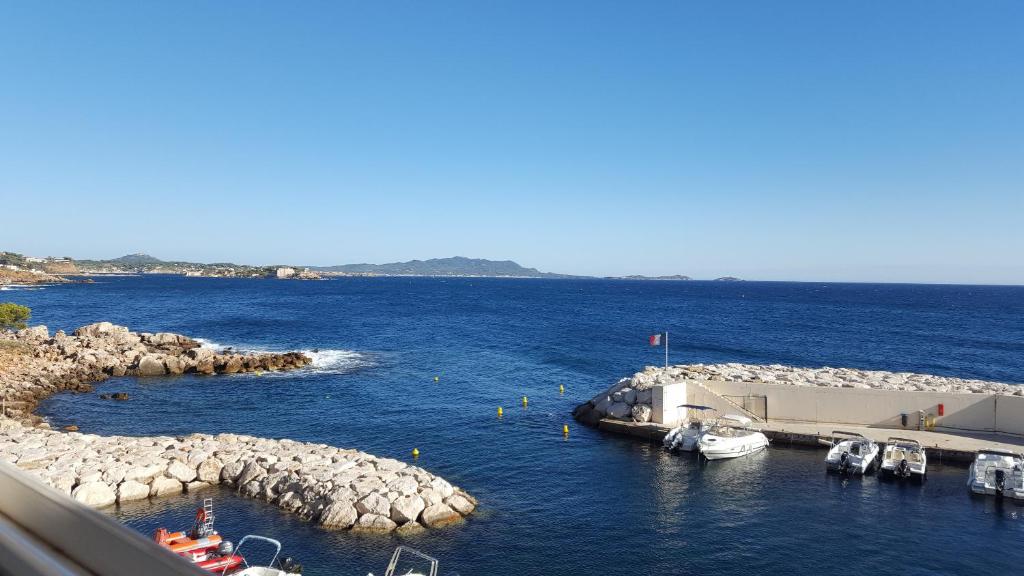 a group of boats docked in a body of water at Appart vue d'exception sur la mer in Bandol