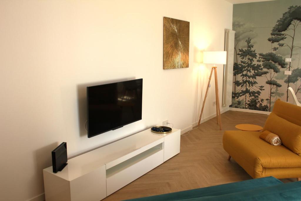 TV a/nebo společenská místnost v ubytování Corte Garibaldi