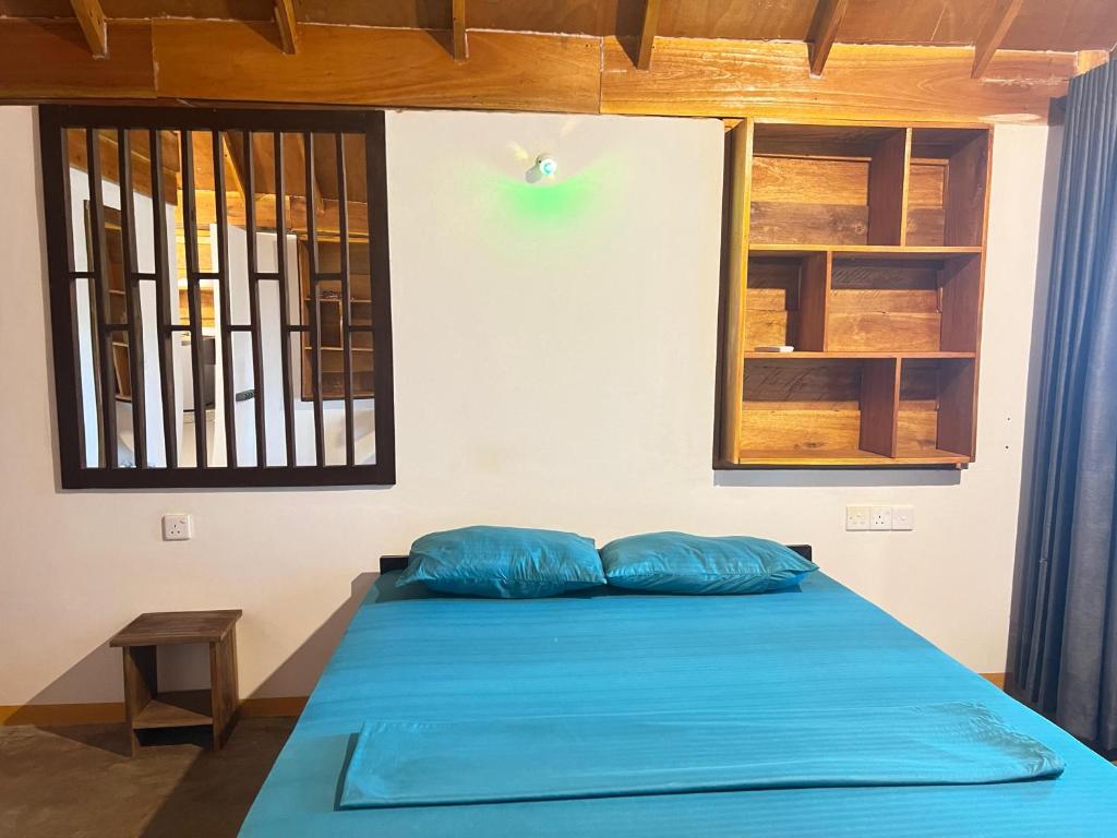 Postel nebo postele na pokoji v ubytování Sand Dune Beach Resort & Surf Camp
