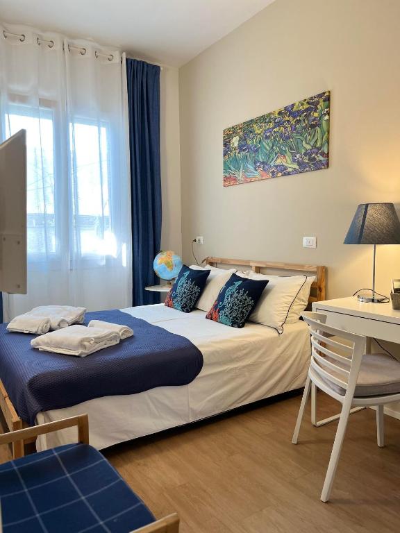 Postel nebo postele na pokoji v ubytování Villa Due Giardini