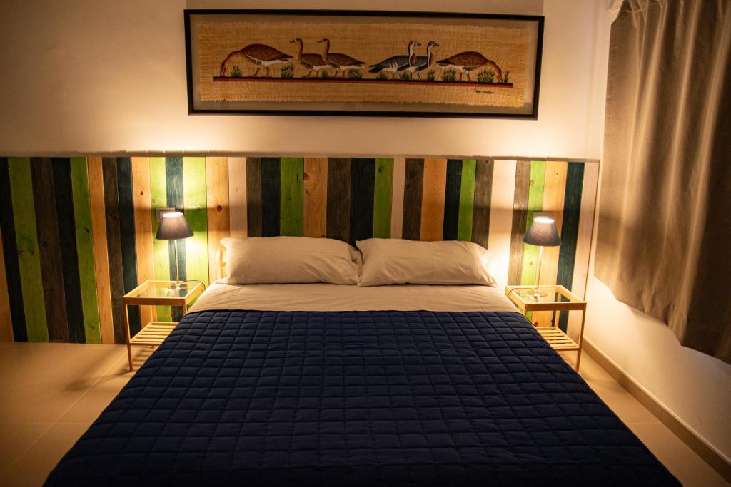 Letto o letti in una camera di B&B Buongiorno Caprarola