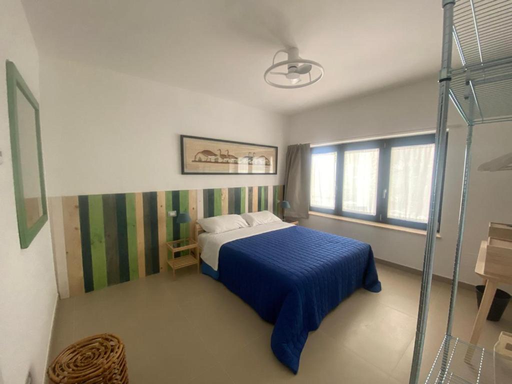 Letto o letti in una camera di B&B Buongiorno Caprarola