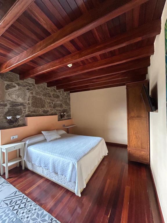 Posteľ alebo postele v izbe v ubytovaní Casa de Costoia