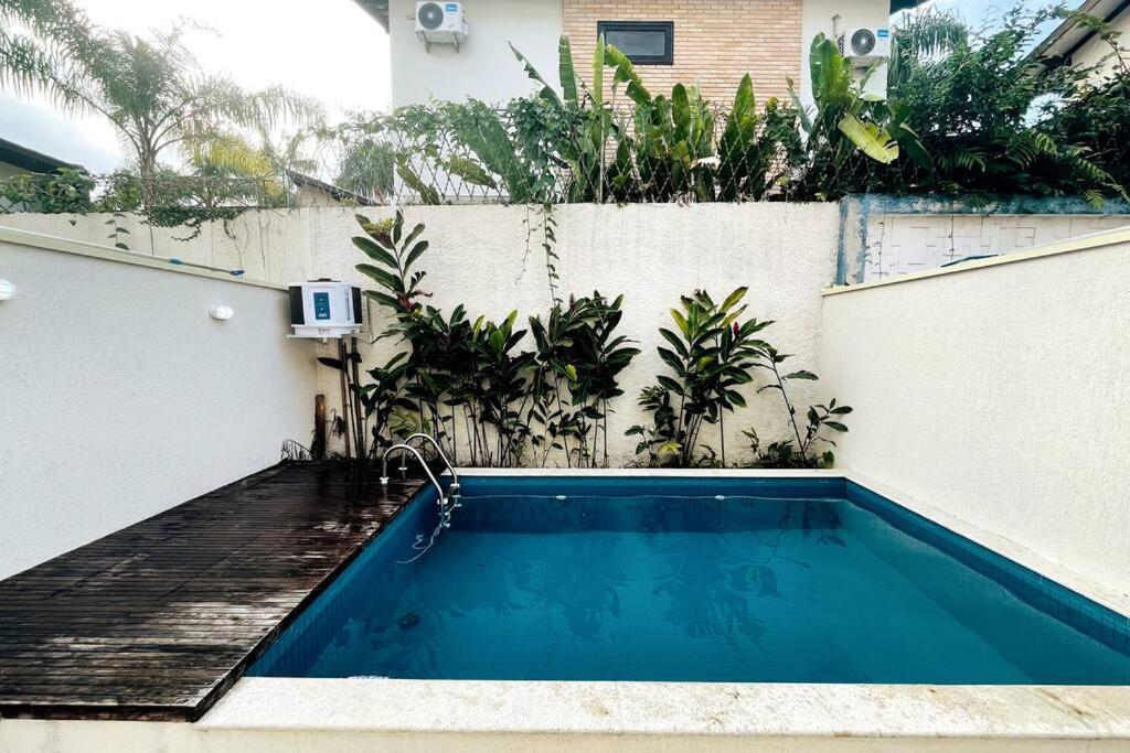 Πισίνα στο ή κοντά στο Casa Juquehy Piscina Privativa e Serv de Praia