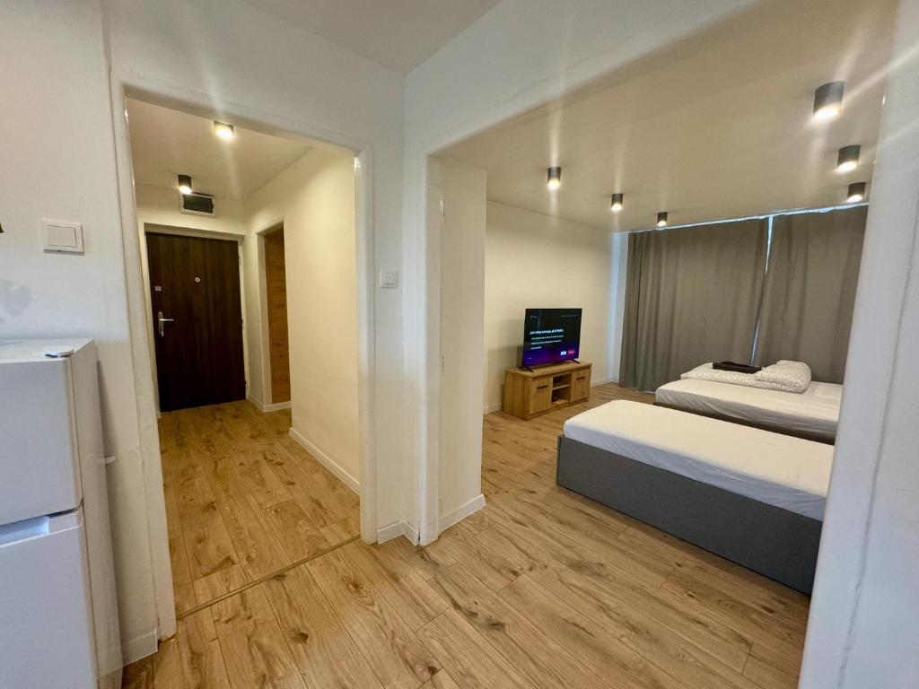 Postel nebo postele na pokoji v ubytování Apartmán Strážske s balkónom