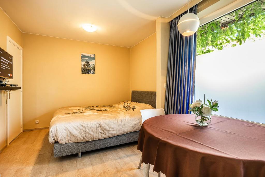 Postel nebo postele na pokoji v ubytování Villa De Keyser