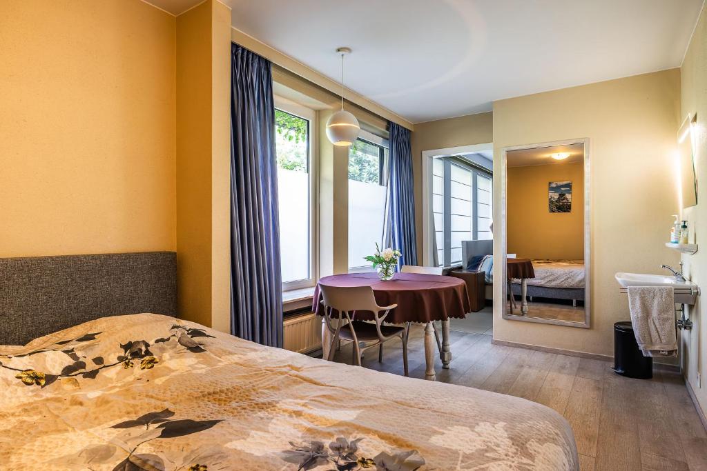 Postel nebo postele na pokoji v ubytování Villa De Keyser