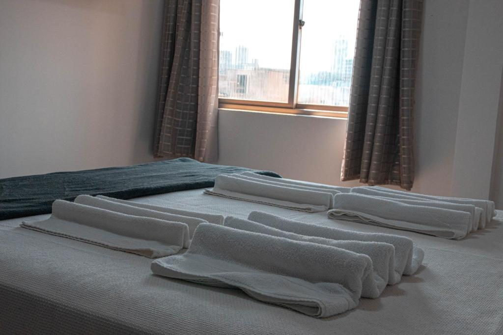 Postel nebo postele na pokoji v ubytování Hotel 15 de Julho
