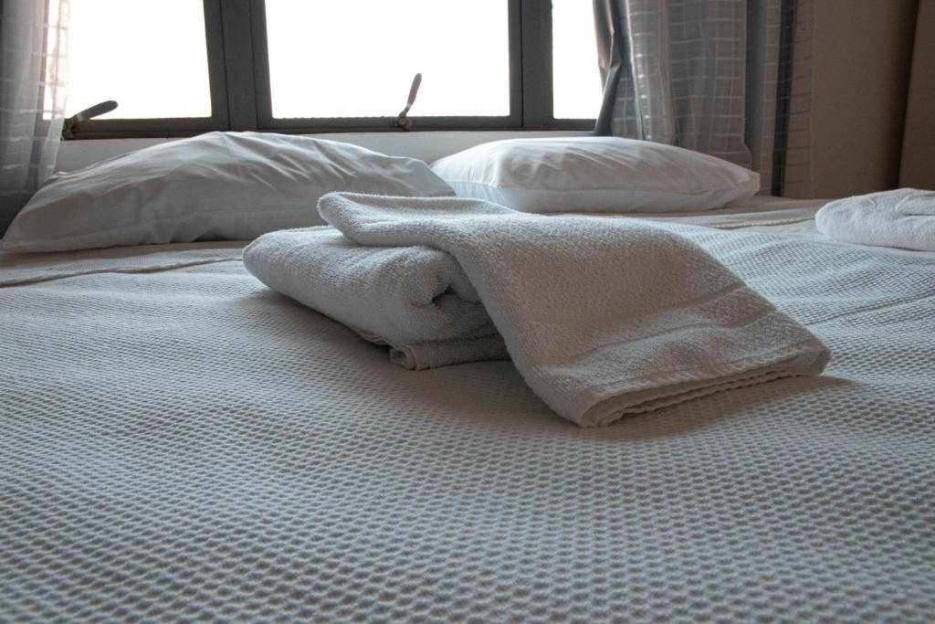 Postel nebo postele na pokoji v ubytování Hotel 15 de Julho