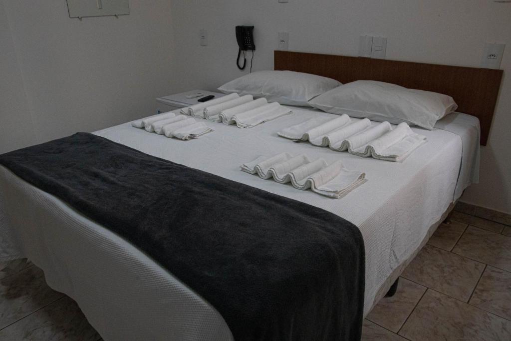 Postel nebo postele na pokoji v ubytování Hotel 15 de Julho