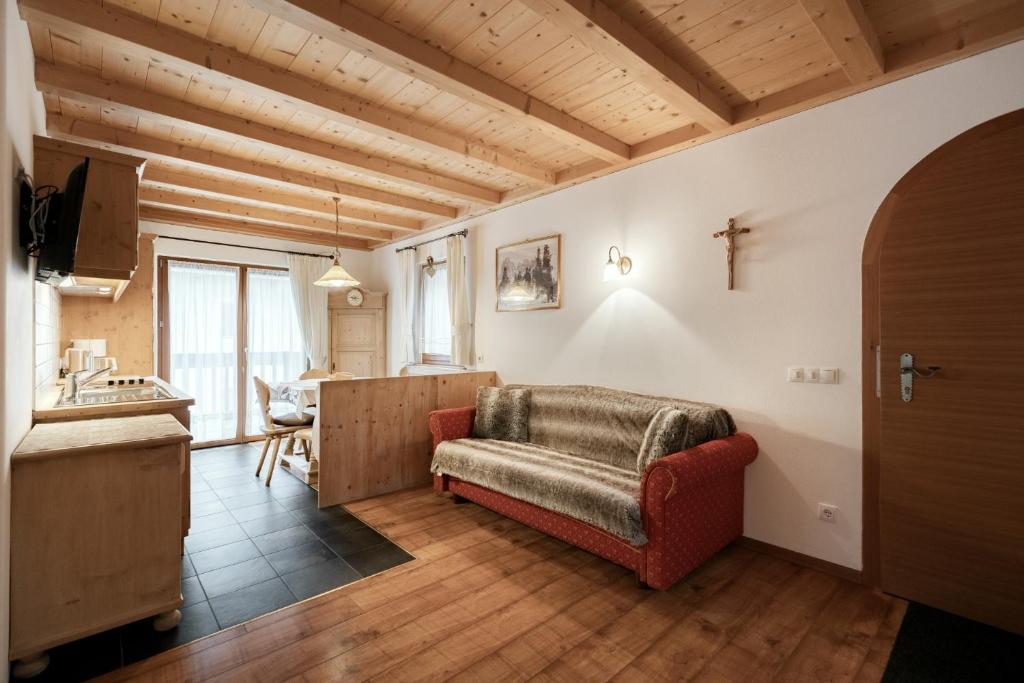 Televízia a/alebo spoločenská miestnosť v ubytovaní Apartments Isgla