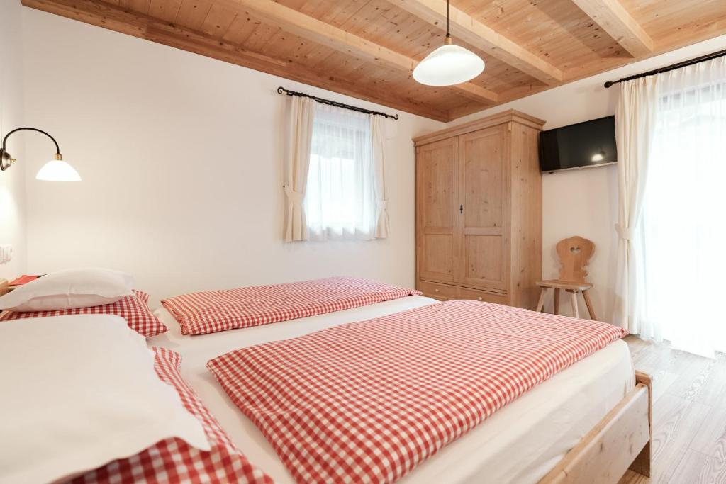 Posteľ alebo postele v izbe v ubytovaní Apartments Isgla