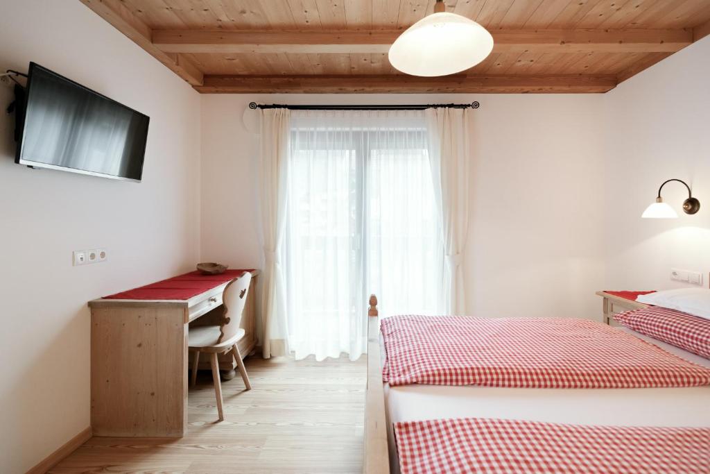 Posteľ alebo postele v izbe v ubytovaní Apartments Isgla