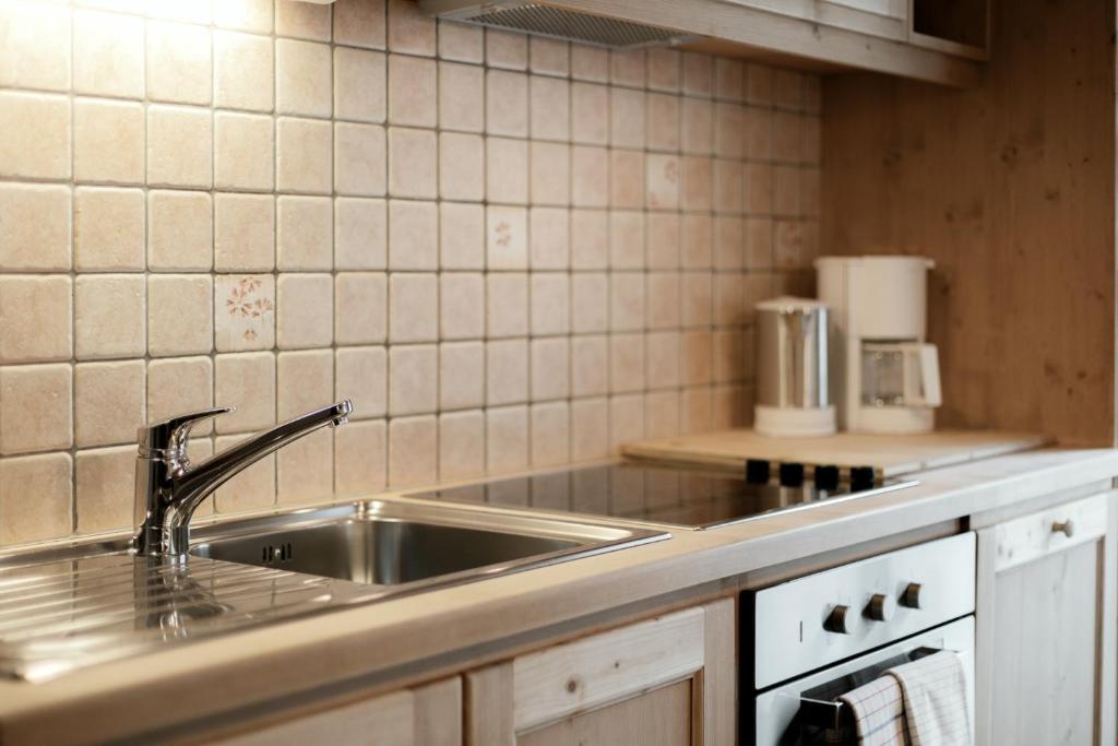 Kuchyňa alebo kuchynka v ubytovaní Apartments Isgla