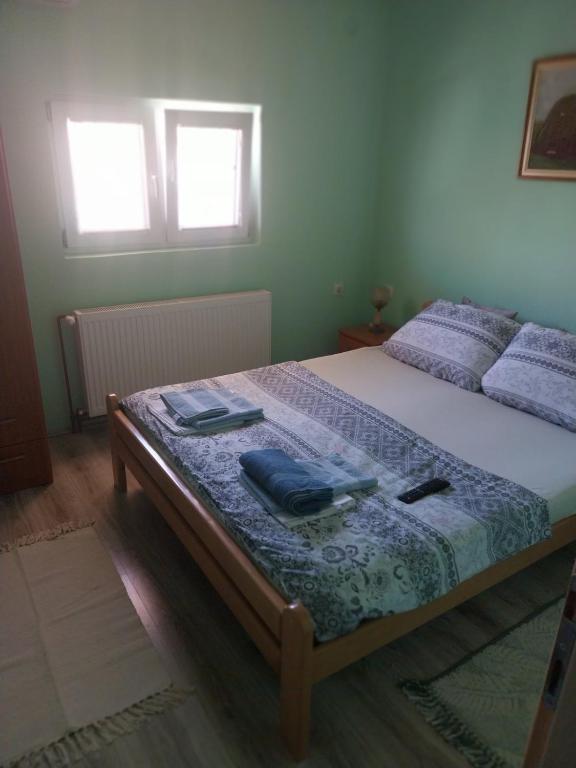 Postel nebo postele na pokoji v ubytování VILANATALIJA PANSION, APATIN