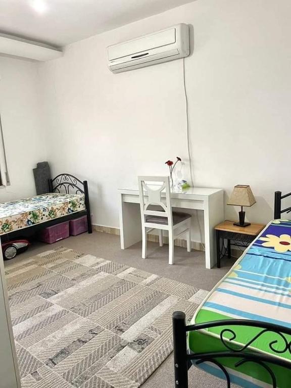 Postel nebo postele na pokoji v ubytování Easy option Guest House