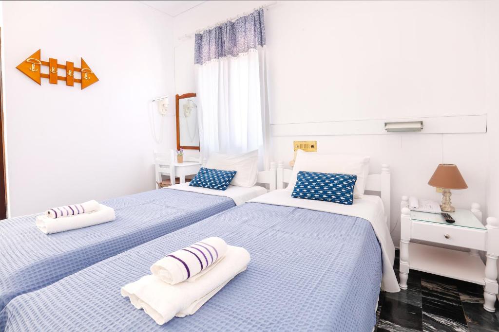 Postel nebo postele na pokoji v ubytování Melissani hotel