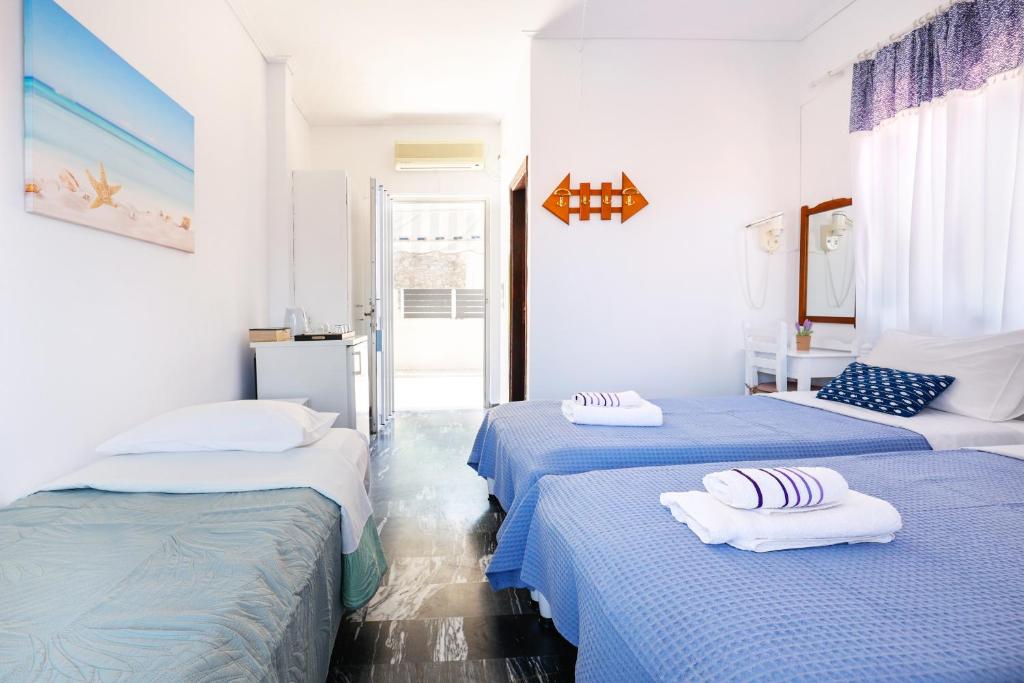 Postel nebo postele na pokoji v ubytování Melissani hotel