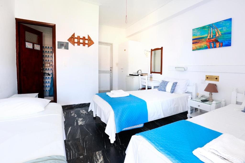 Postel nebo postele na pokoji v ubytování Melissani hotel