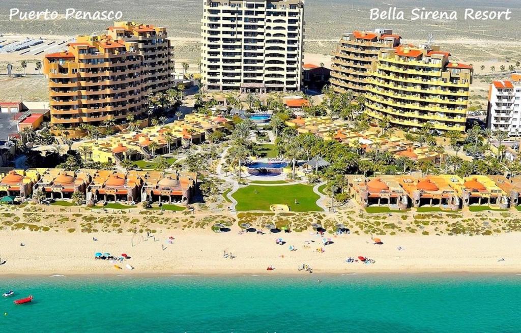 an aerial view of a beach with hotels and buildings at Bella Sirena Resort Premium View Condo in Puerto Peñasco