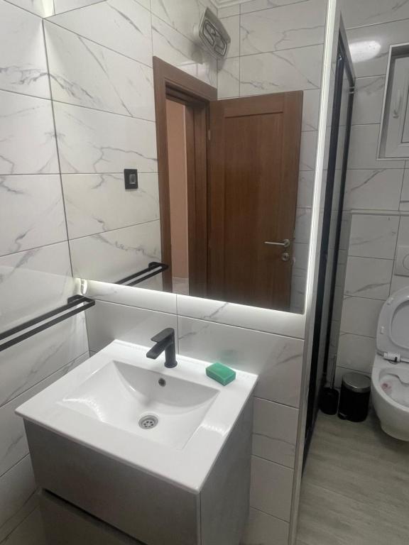 Vannituba majutusasutuses Apartman D&L