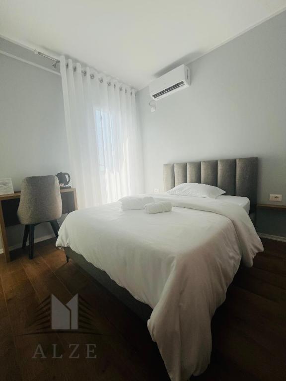 Voodi või voodid majutusasutuse Alze Hotel - Tirana toas